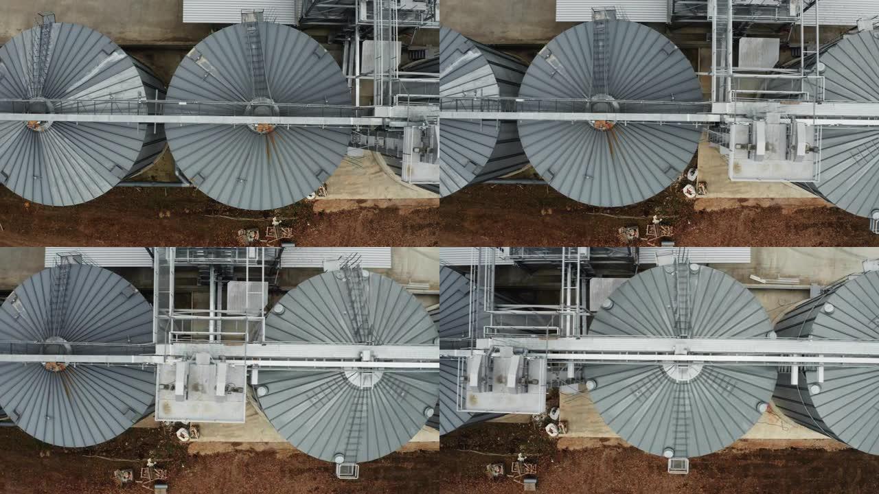 小麦储粮提升机俯视图。用于工业作物的谷物储存箱。