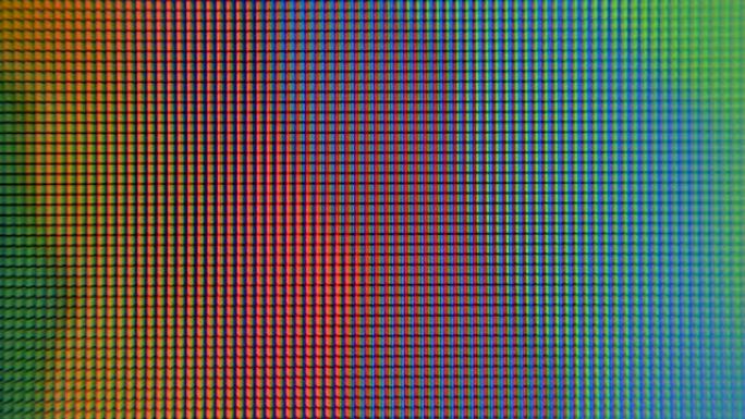 像素监视器上的慢动作彩虹色。动态背景。