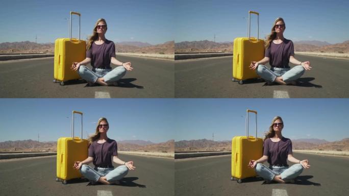 年轻女性旅行者的肖像用黄色行李4k在hihgway冥想