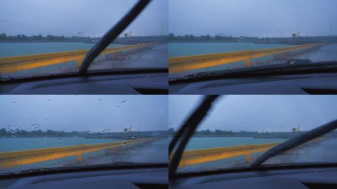雨水落在站立的汽车挡风玻璃上