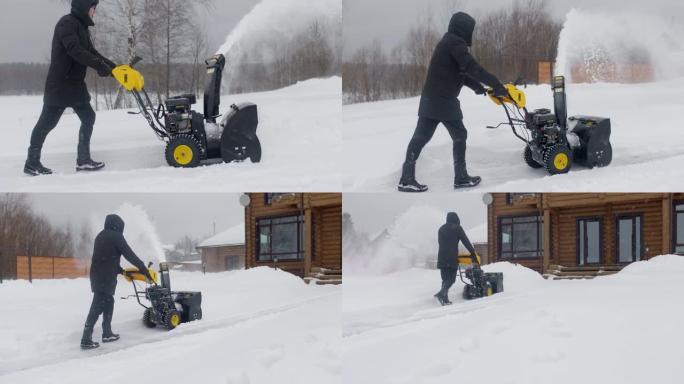 大雪过后，男人用木屋的扫雪机清理积雪。扫雪机在工作。慢动作