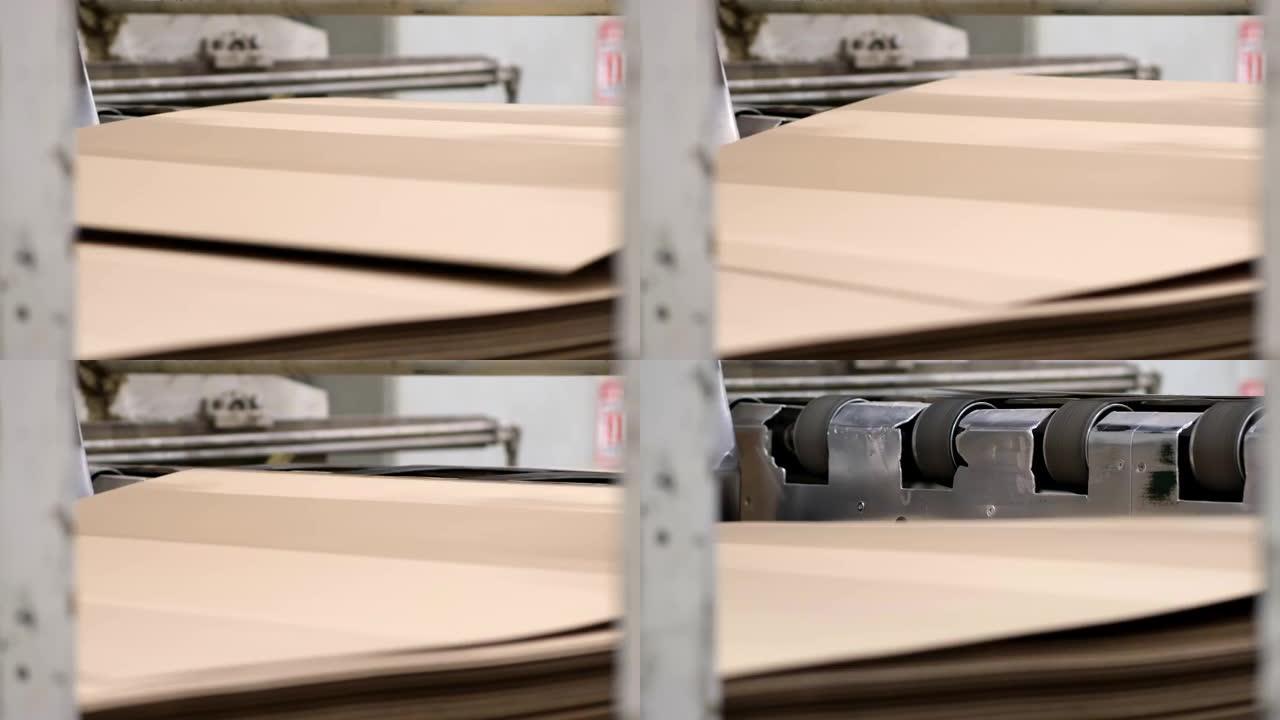 纸板容器生产企业。纸板制造分层辊辊工业工业印刷包装材料特写纸瓦楞纸箱厂。