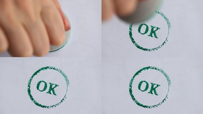 女人手在文件特写4k电影上贴上绿色邮票