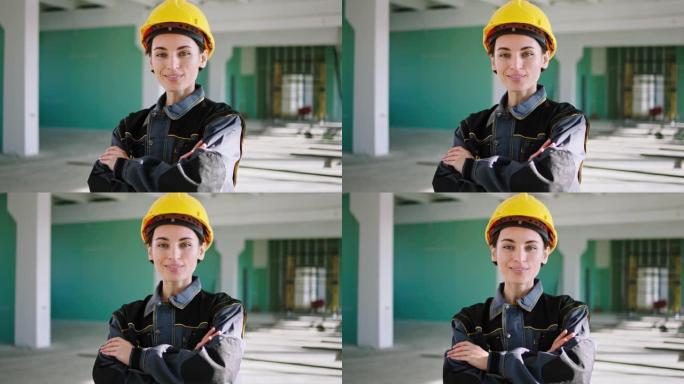 在阳光明媚的日子里，她戴着安全帽和设备，在建筑工地的镜头前摆出美丽的工程师微笑。在阿里·阿列克谢迷你