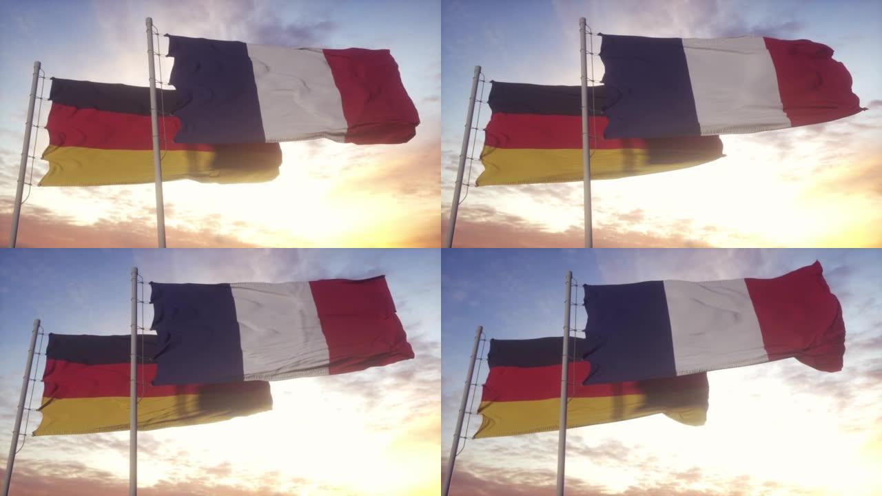 德国和法国国旗插在旗杆上。德国和法国的旗帜在风中飘扬。德国和法国的外交理念