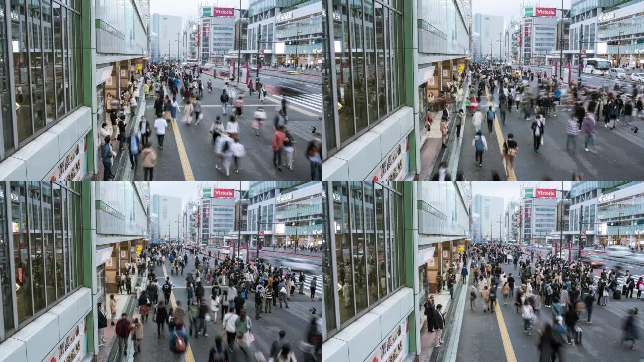 人们在东京新宿火车站附近的人行道上行走的延时视频