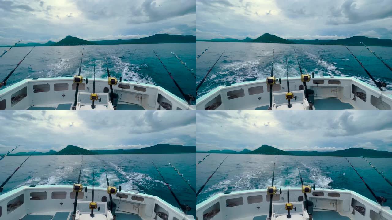 视点POV从深海游艇后面近距离拍摄。自然环境下的大型游戏渔线轮