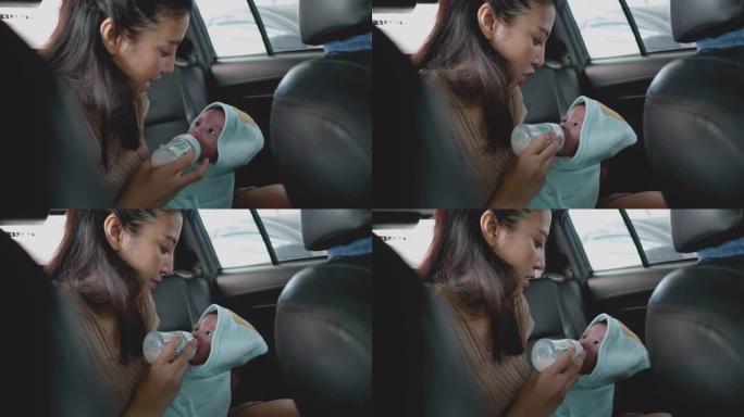 车里的亚洲婴儿。