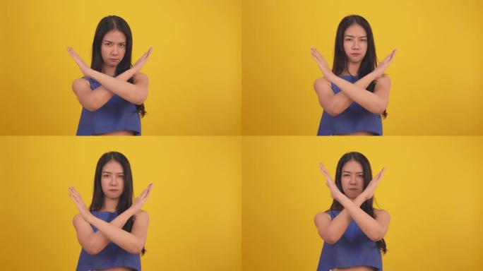 非裔美国年轻女子在孤立的黄色背景上没有做手势。