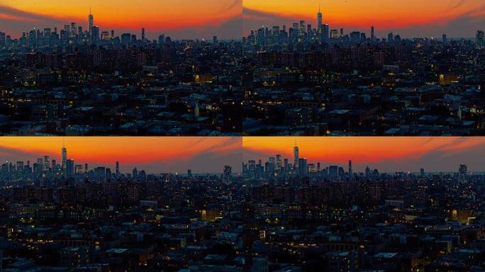 曼哈顿市区和自由塔上空的戏剧性天空在夜晚照亮。日落时分，可以看到布鲁克林住宅区的远景。轨道平移摄像机