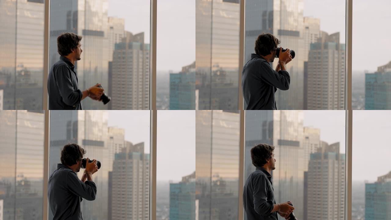 男子在窗户上拍照的长镜头