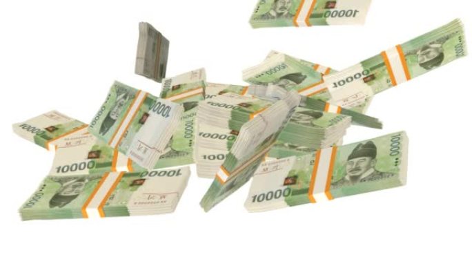 许多钱落在桌子上。10000韩国韩元纸币。