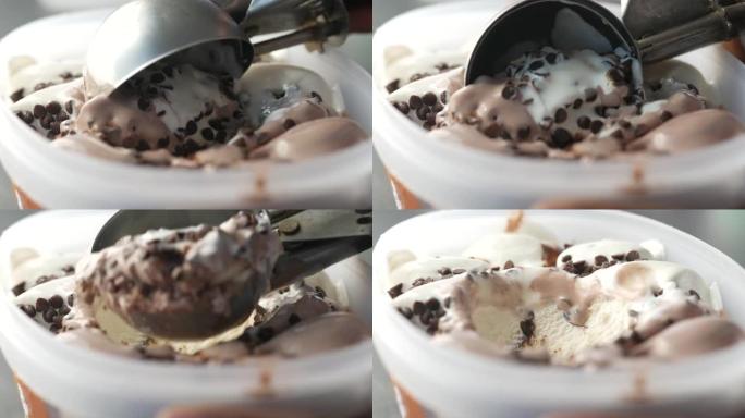 用勺子从碗里手工采摘冰淇淋