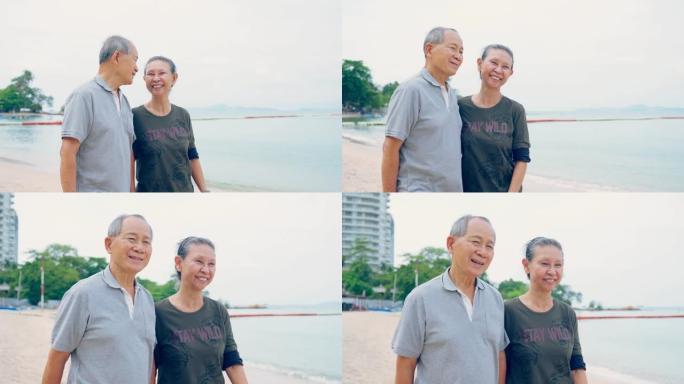 亚洲幸福的家庭，迷人的高级老人在夏天与年长的成熟祖母一起在海滩上散步时感到新鲜和放松，在海岛享受假期