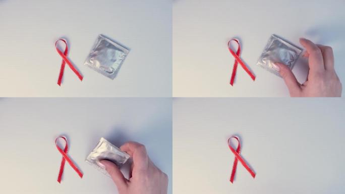 避孕套靠近艾滋病意识红丝带