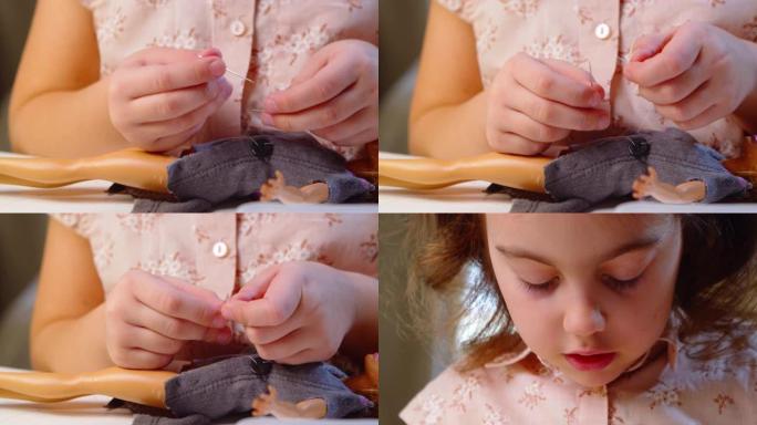 小女孩在洋娃娃的衣服上缝了一个纽扣
