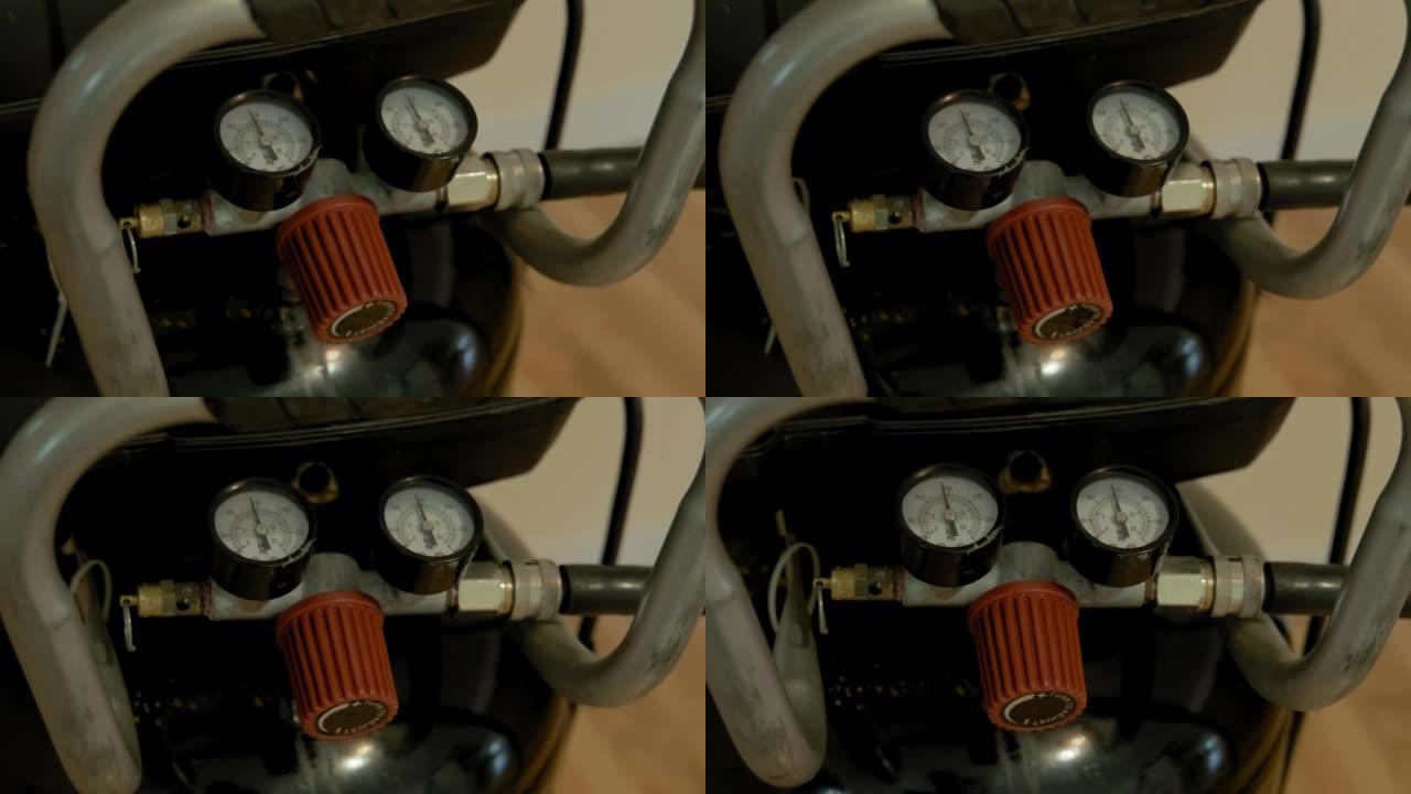 咖啡豆焙烧机上的圆形工业压力表。测量设备、测量压力的传感器、压力计技术。