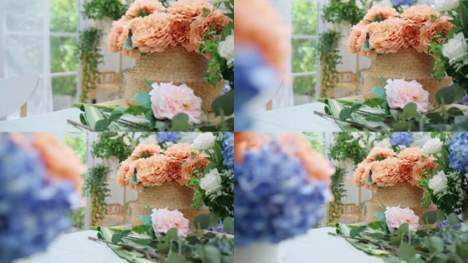 花卉花束经营店多莉镜头，美丽的鲜花绣球花白玫瑰和天然篮子在鲜花小经营店晨光桌上排列