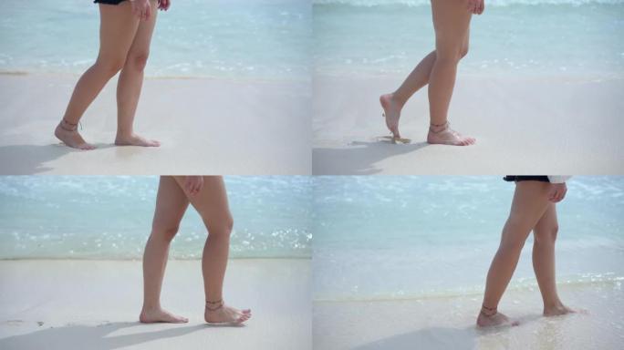 在海边散步的女性双腿特写