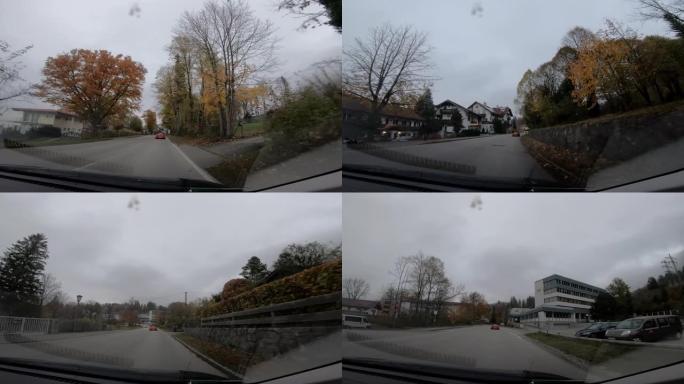 奥地利欧洲高速公路上的驾驶员视点，从车内行驶，带自然森林景观树和山地
