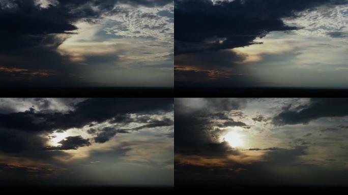 日落场景云在黑暗背景现实云上的时间流逝。