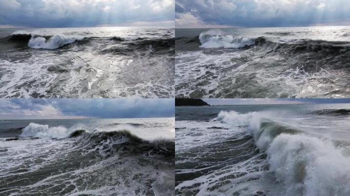 强大的波浪形成，在岸上破裂并溅起白色泡沫