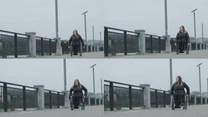 有身体残疾的妇女使用轮椅在户外行走