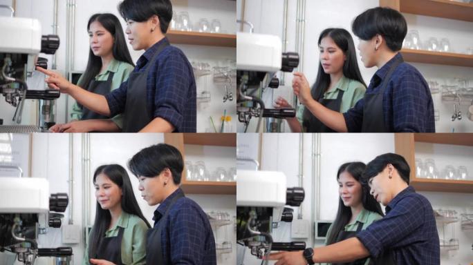 两名穿着围裙的亚洲女性在咖啡厅餐厅交谈并教授如何使用咖啡机。