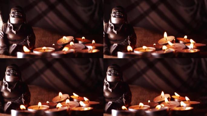 佛像冥想与茶灯蜡烛
