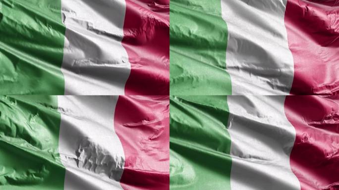 意大利纺织的旗帜在风中缓缓飘扬。意大利旗帜在微风中平稳摇摆。面料纺织组织。完全填充背景。20秒循环。