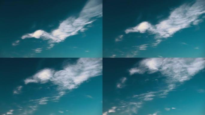 卷云云天空在多云的天空中移动。天空背景云景4k延时，延时，延时。4k背景。抽象的蓝色和白色