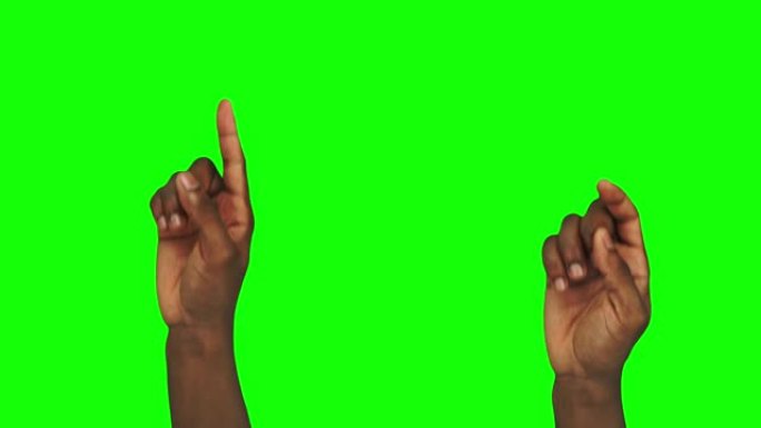 由黑人双手控制绿色屏幕背景上的触摸屏的23个手势包
