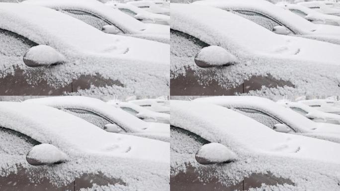 日光暴风雪中的一排停放的汽车-慢动作特写