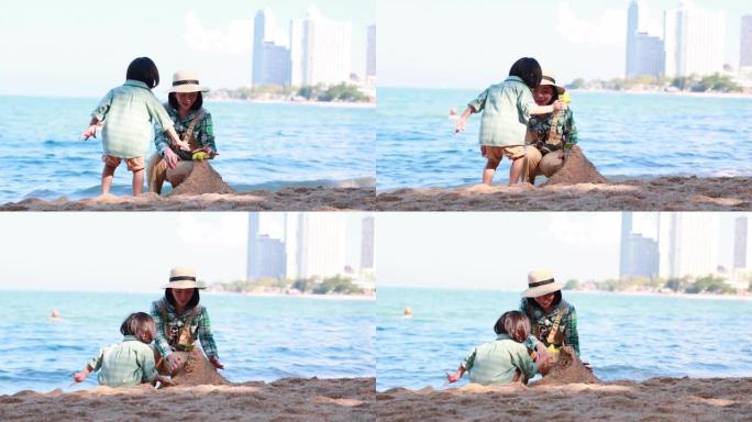 亚洲母子在海滩上玩耍。快乐的亚洲家庭玩得开心，在海滩上散步。暑期旅游和假期假期。