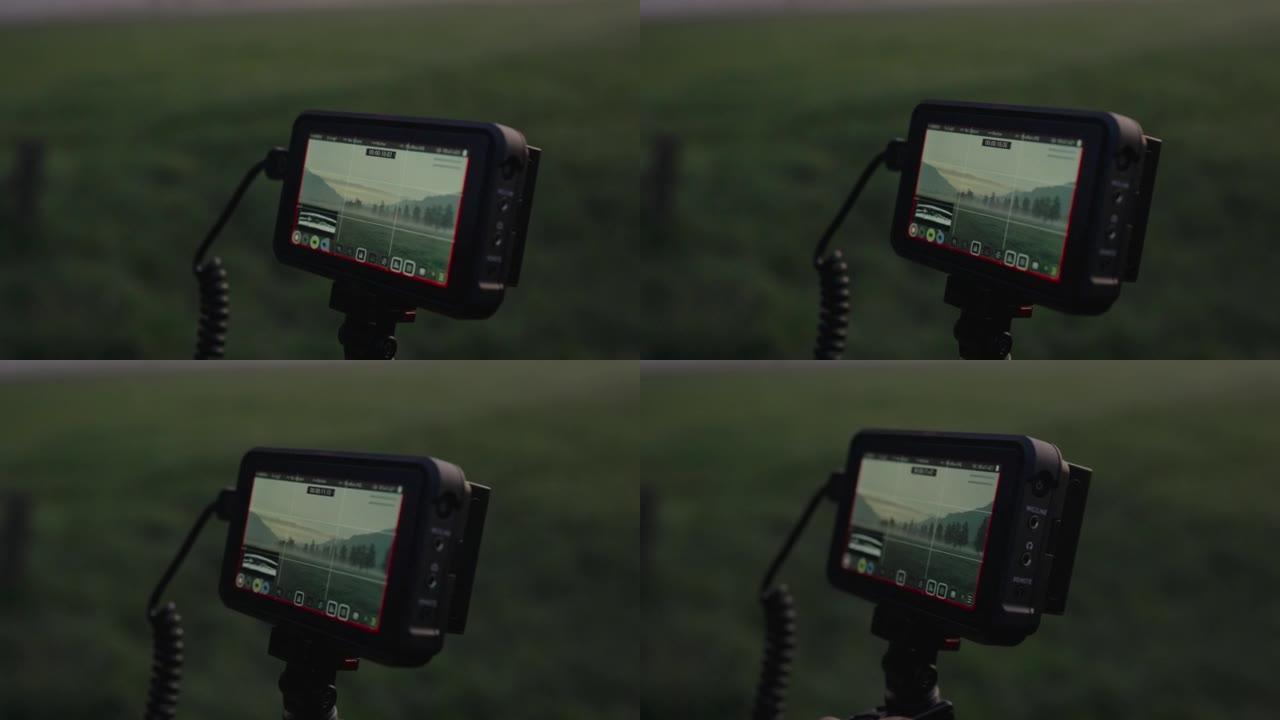 雾蒙蒙的草地摄像机上的监视器