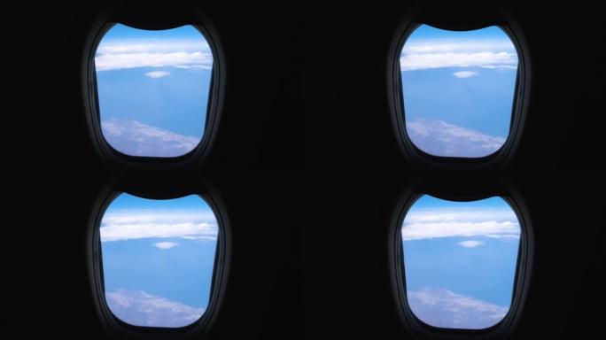 在旅行中看着飞机窗外看到蓝天
