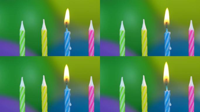 蜡烛周年纪念派对，模糊气球背景，生日庆祝活动