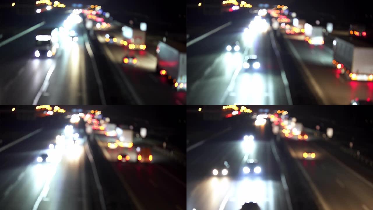 夜间高速公路上的汽车灯
