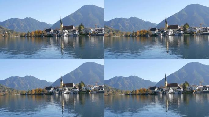 巴伐利亚阿尔卑斯山泰格恩湖的美丽景色。湖边和山边的老教堂