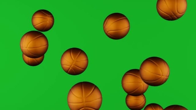 许多金色的篮球球落在chromakey背景上。