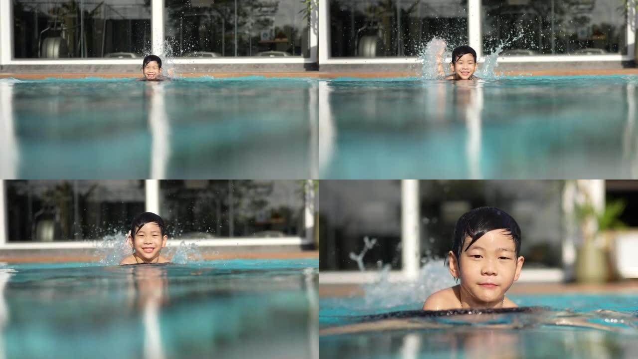 慢动作拍摄亚洲家庭，妈妈和儿子在游泳池里玩得开心，一起享受和玩水