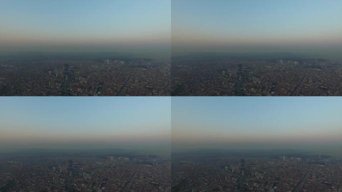 日落时的高角度空中城市景观-无人机拍摄伊斯坦布尔拥挤的大城市景观-大量钢筋混凝土建筑组成-计划外城市