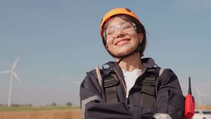 风电场穿着防护服的亚洲女工程师