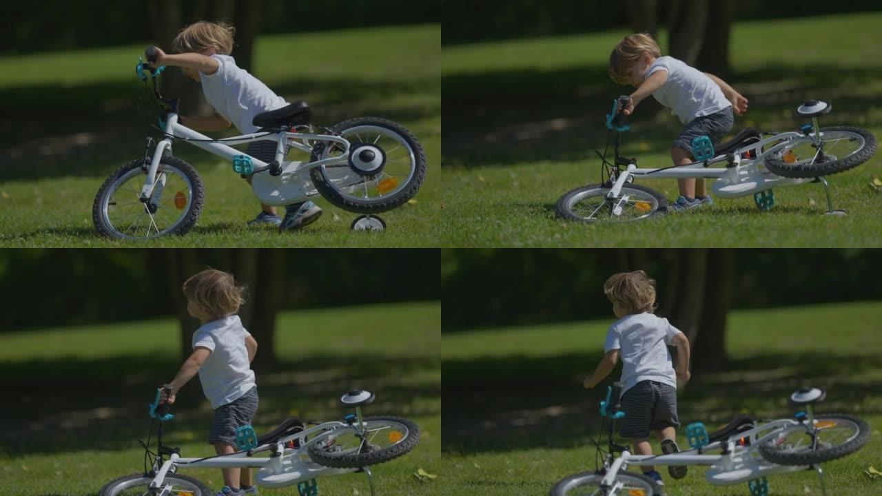 一个小男孩推着自行车掉到地上