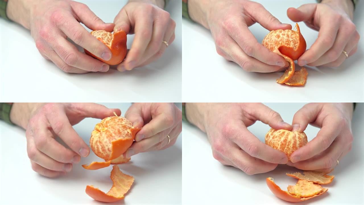 男子在白色桌子上剥橘子的特写镜头