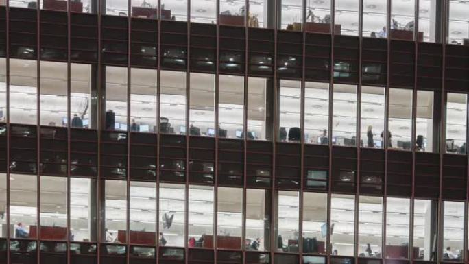 英国伦敦工人流动的摩天大楼办公商务大楼，英国，延时平移，放大和俯视图
