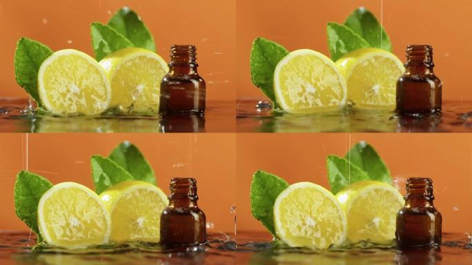 柠檬的一半和瓶装水特写，柠檬汁。下雨，橙色背景上的芳香血清。液体柑橘提取物，护肤常规，水疗概念。传统
