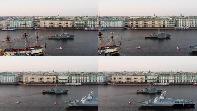 清晨，一艘现代军用船沿着宫殿堤岸飞行，这艘船仿照古代的波尔塔瓦号护卫舰，在俄罗斯海军冬宫度假之前