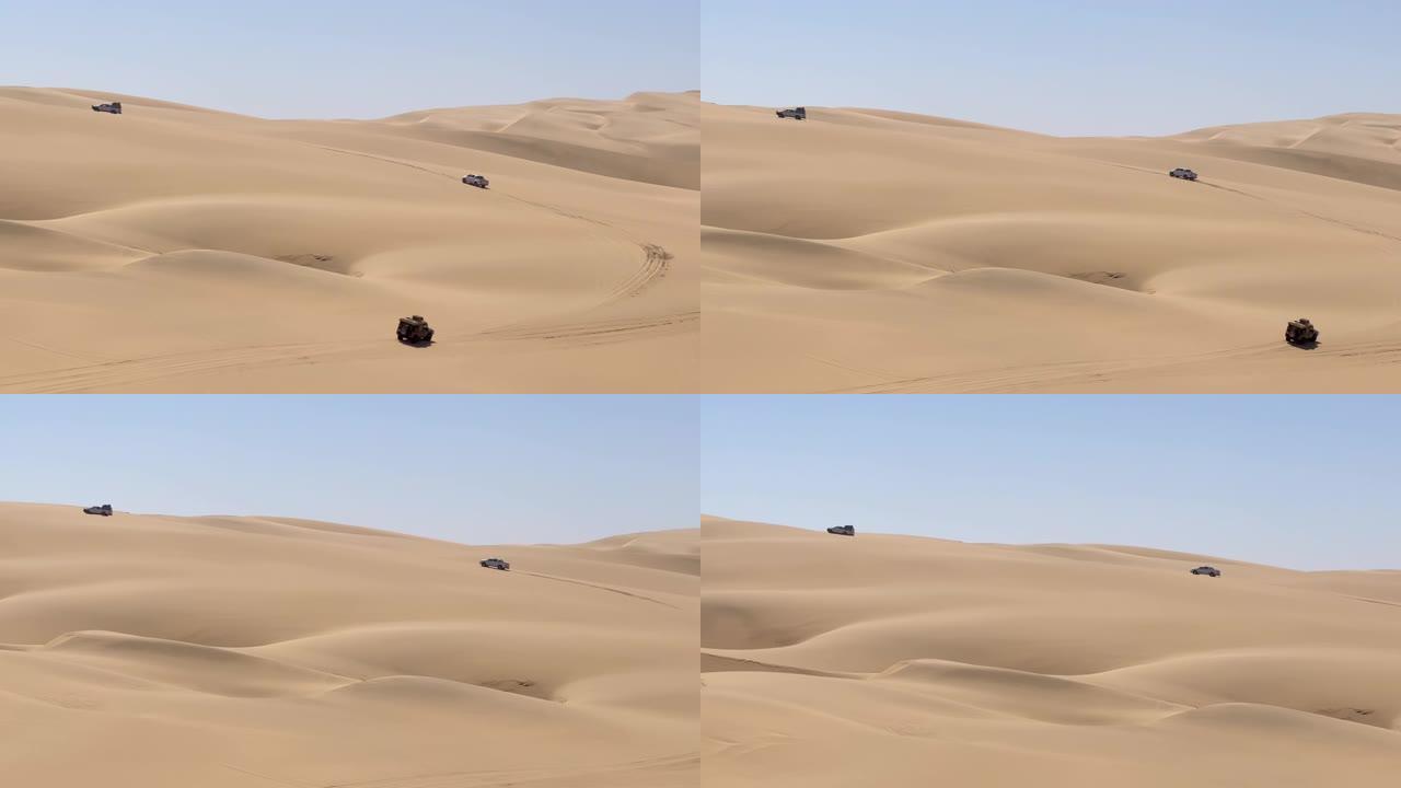 沙丘在沙漠中行驶。非洲的白色SUV汽车越野旅行
