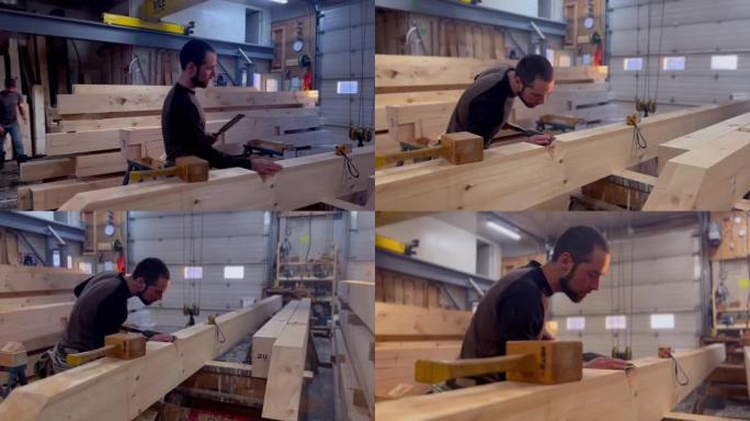 木工车间修剪木梁，用于生态自建房屋结构